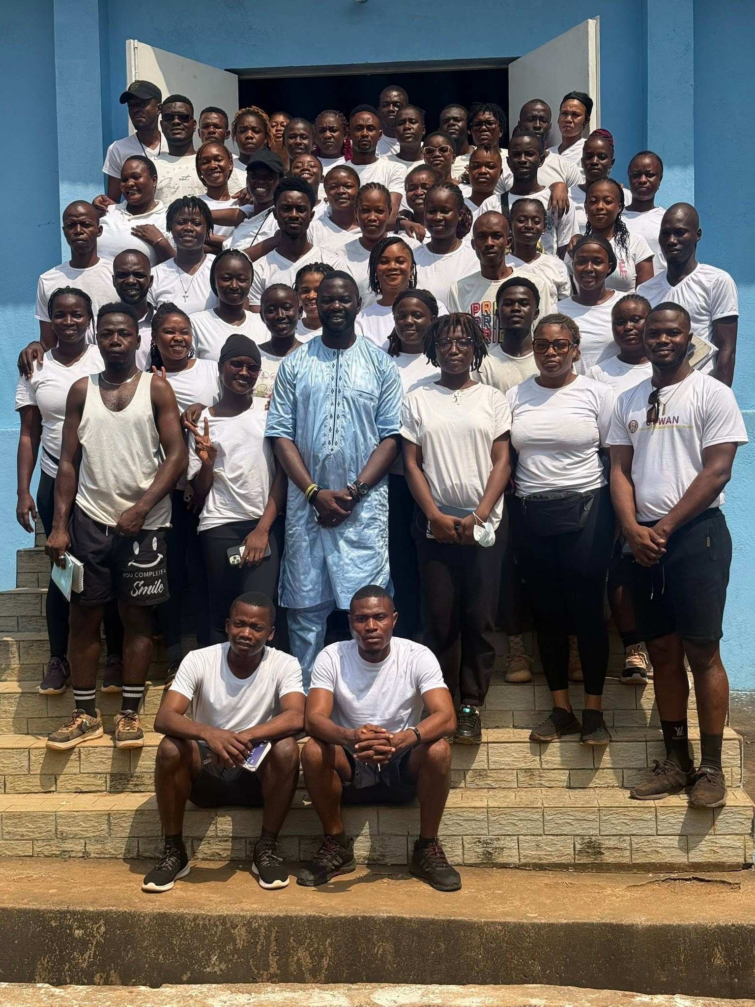 The team and trainees together.